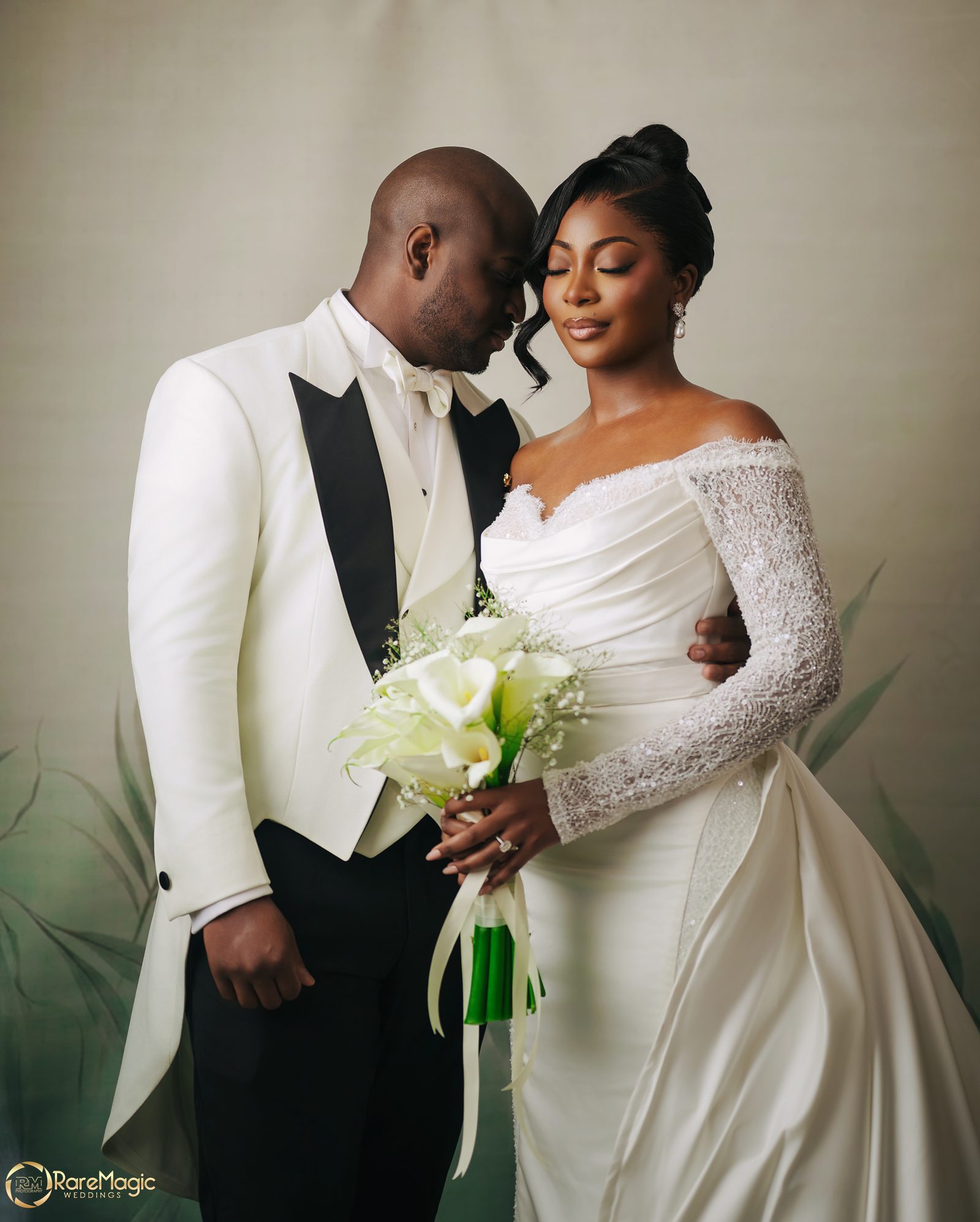 Bride and groom with a white bouquet